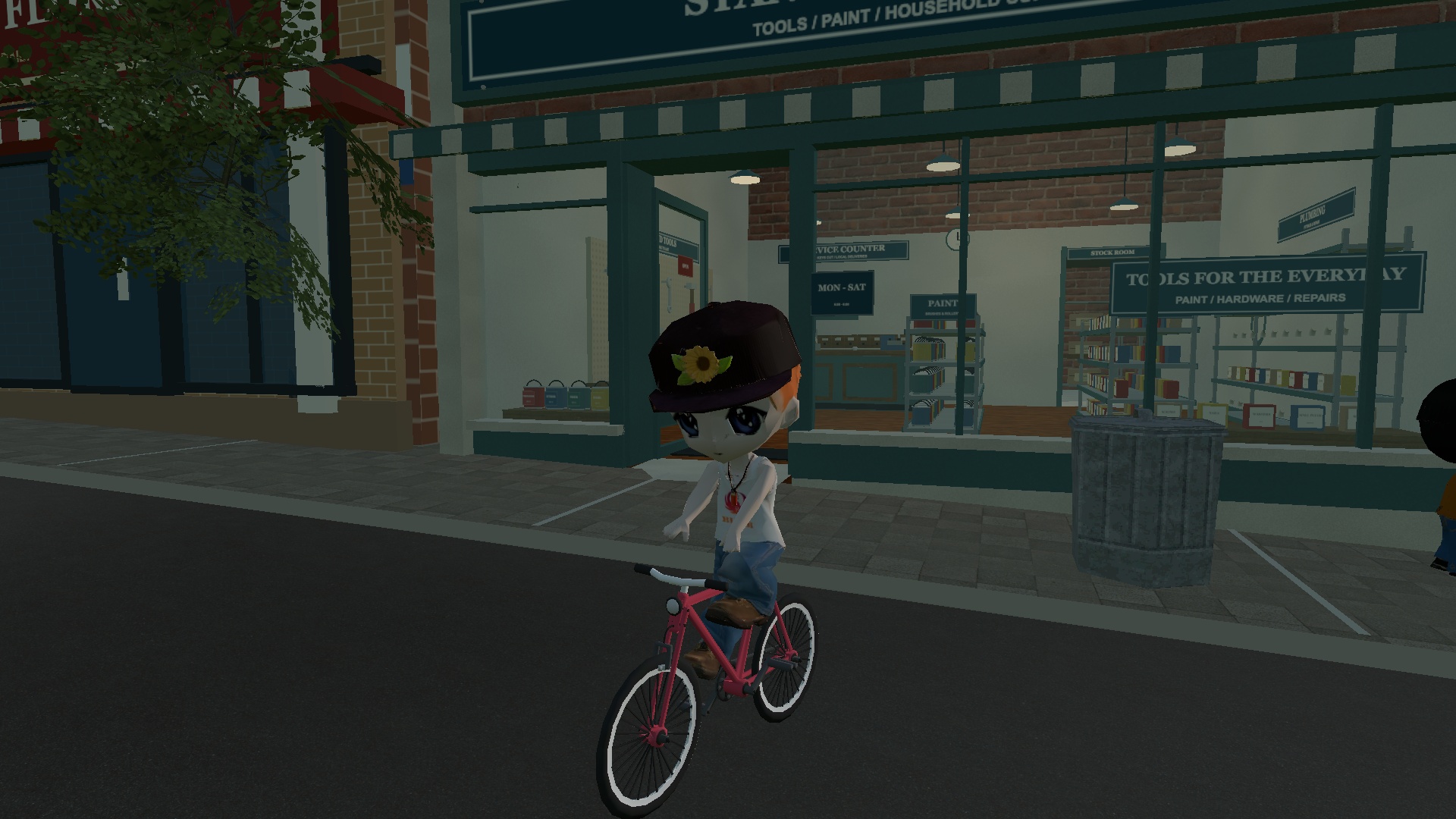 Kin on his bicycle outside Stanly Hardware
